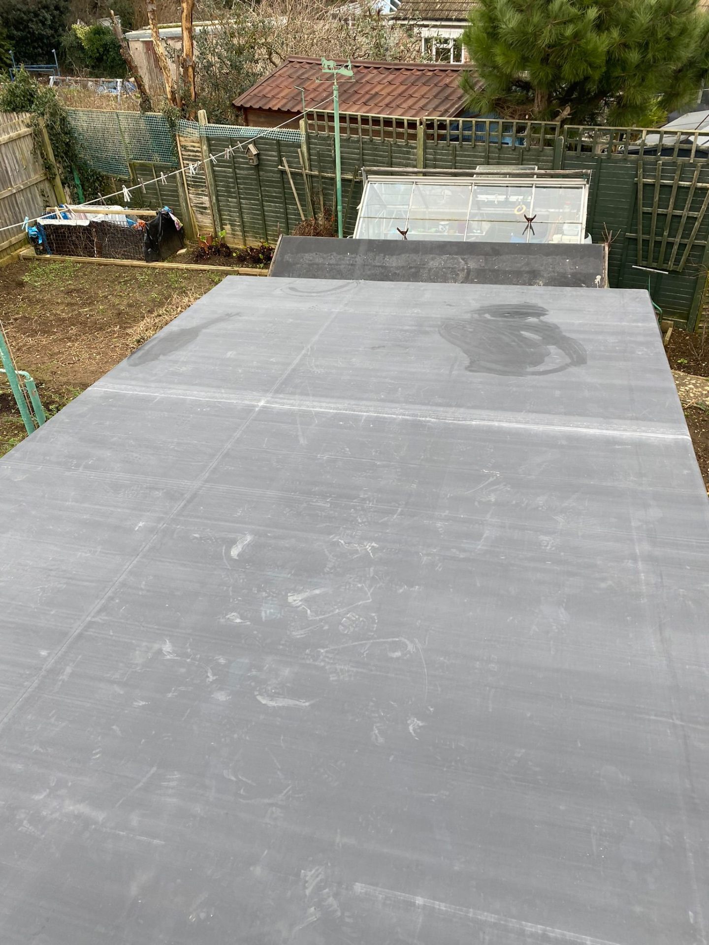 Completed GRP fibreglass flat roof on a residential garage extension